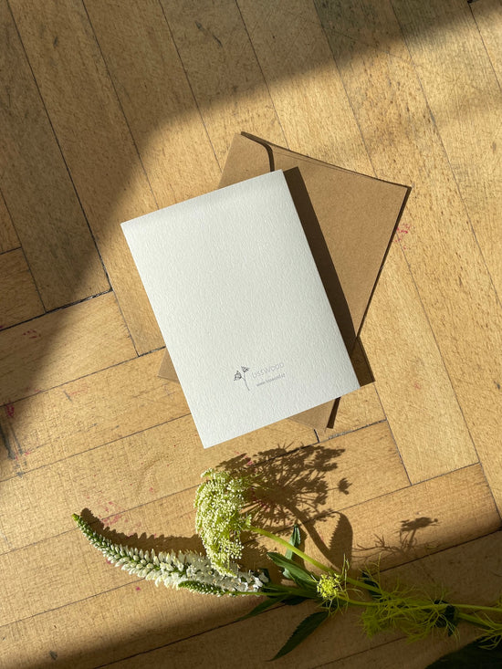 Přání s vylisovanou sasankou